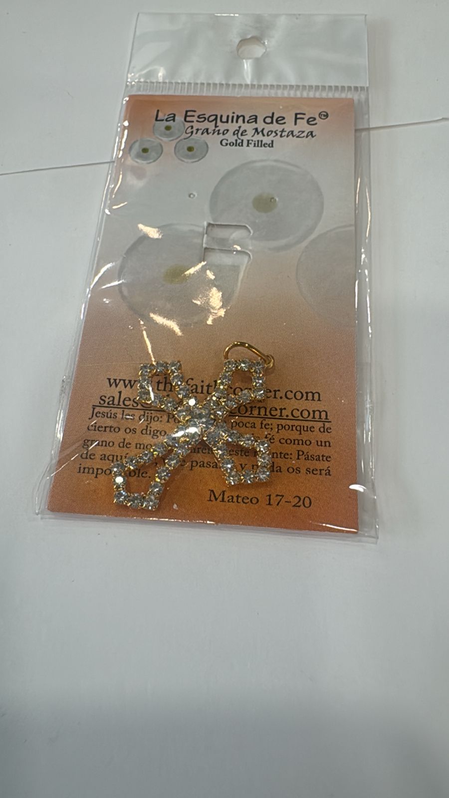 DIJE CRUZ CON PERLAS EN EL CONTORNO