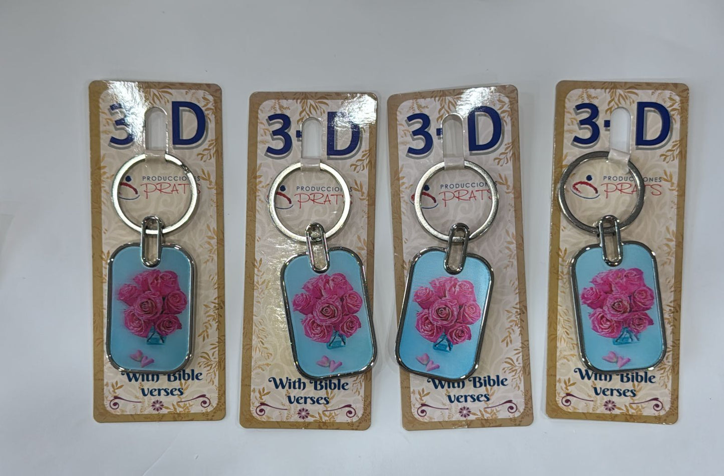 LLAVEROS 3 DE CON UN RAMO DE ROSAS